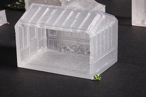 Looking through the side of a greenhouse at the tools inside...