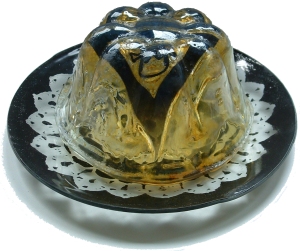 Kiln-formed glass made in a vintage jelly mold...