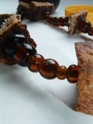 Detail showing the transparent amber colour of the beads...