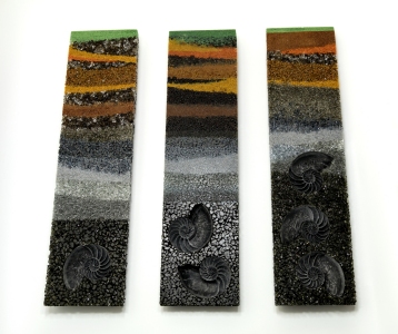 Triptych of layered glass cross-sections of the ground showing embedded nautilus shells awaiting discovery...