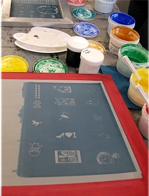 Screens and glass enamels, ready to squeegee across the mesh and onto the glass underneath.